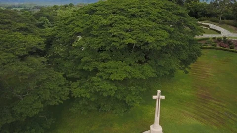 A cross statue and trees Stock Footage 85530575