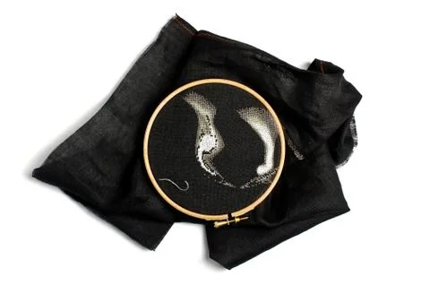 Cross stitching process on the black flax fiber isolated Stock Photos