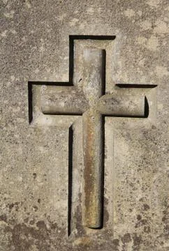Cross on stone background Stock Photos