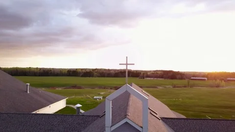 Cross at Sunset: Left Partial Orbit Stock Footage 89611615