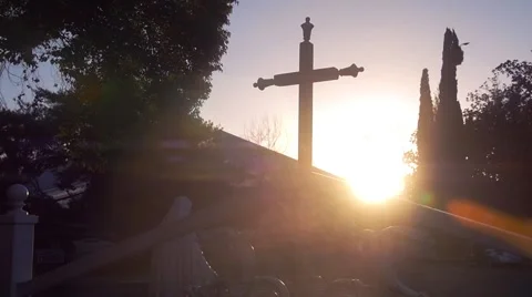 Cross at Sunset with Lens Flare Vídeo Stock 47208735