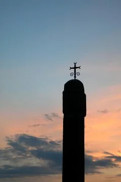 Cross at sunset Stock Photos