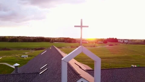 Cross at Sunset: Right Upwards Track Stock Footage 80933423
