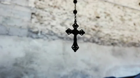 Cross swinging inside car while stopped on road Stock Footage 212406314