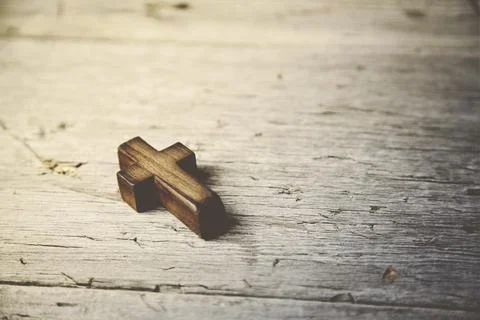 Cross on table Stock Photos