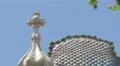 Cross on top of Casa Batllo in Barcelona 4k or 4k+ Resolution