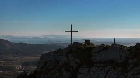 Cross on Top Of The Miradoiro do Monte Tahume - aerial shot Stock Footage 304664087