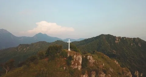 Cross on the top of the mountain with drone Stock Footage 79440348