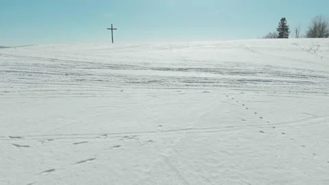 Cross at the top of the mountain drone Video stock 231492486
