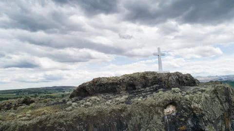 Cross on the top of a mountain Stock Photos