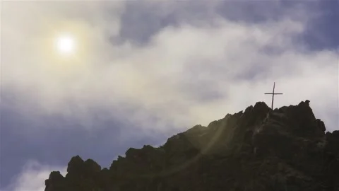 Cross on Top of a Stone Cairn and Clouds Passing Fast, Andes Mountains. Stock Footage 114952146