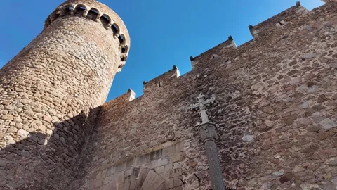 Cross at the tower of medieval castle with blue sky, 4K Stock Footage 265520800