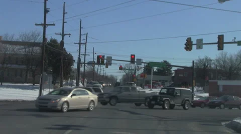 Cross traffic at a red light Stock Footage 1053015