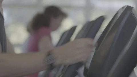 Cross trainer at gym Stock Footage 74116603