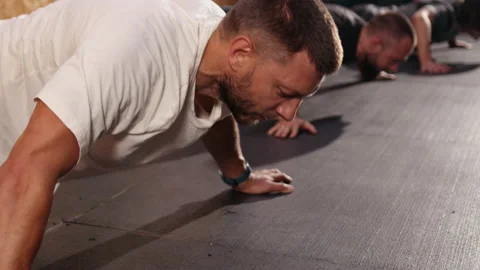 Cross-training exercise facility. Beautiful athlete doing some push ups gym. Stock-Footage 165441993