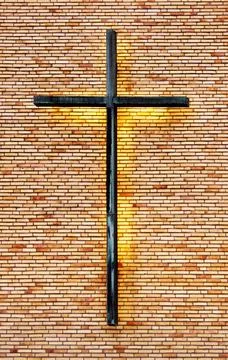 Cross on wall Stock Photos