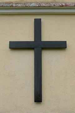 Cross on wall. Stock Photos