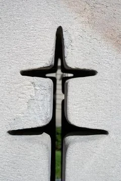 Cross on white wall Stock Photos