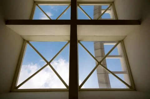 Cross window of enlightenment Stock Photos