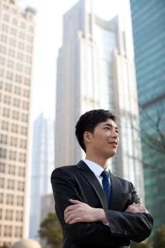 Cross your arms. Vertical composition Young men White-collar workers Staff Stock Photos