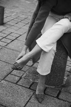 Crossed Elegance on Cobblestones Stock Photos