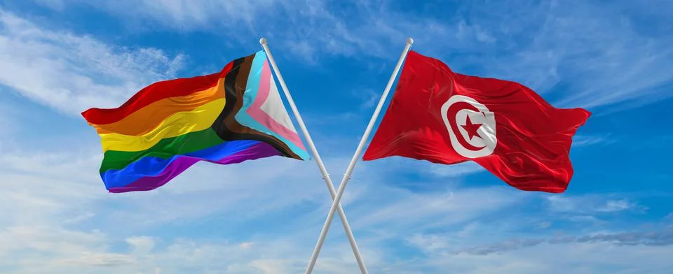 Crossed flags of progress lgbt pride and Tunisia flag waving in the wind at c Illustrazione stock