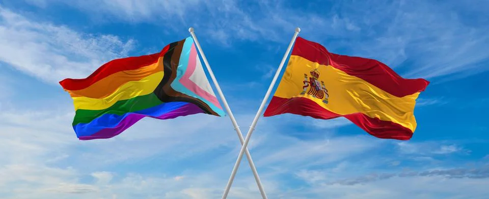 Crossed flags of progress lgbt pride and Spane flag waving in the wind at clo Stock Illustration
