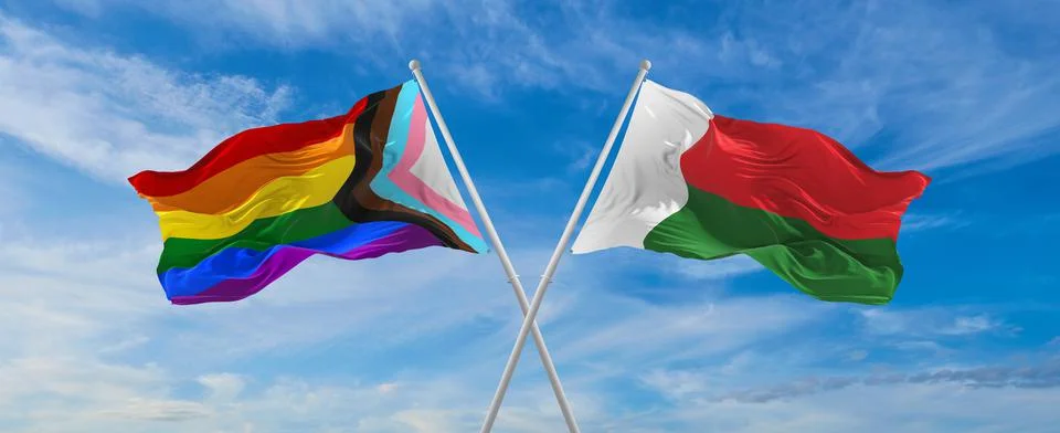 Crossed flags of progress lgbt pride and Madagascar flag waving in the wind a Stock Illustration