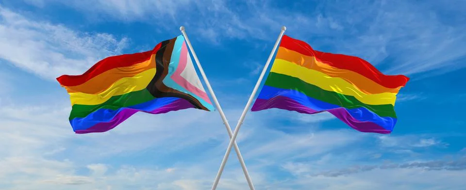 Crossed flags of progress lgbt pride and LGBT Pride flag waving in the wind a Stock Illustration