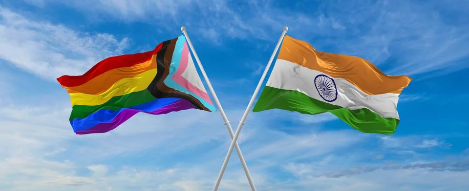 Crossed flags of progress lgbt pride and India flag waving in the wind at clo Illustrazione stock