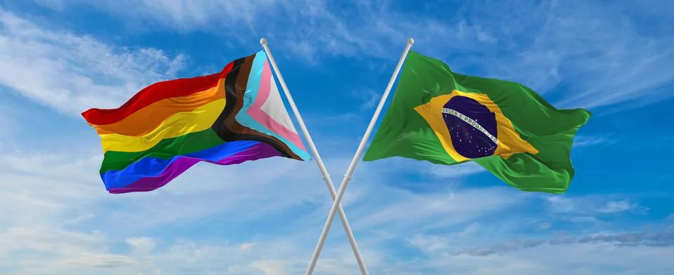 Crossed flags of progress lgbt pride and Brazil flag waving in the wind at cl Ilustração Stock