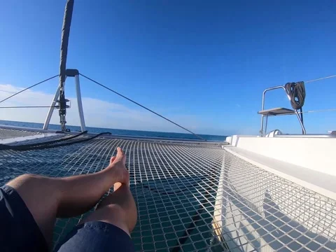 Crossed Legs on a Boat Stock Footage 165015320