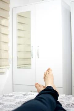 Crossed legs Stock Photos