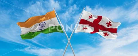 Crossed national flags of India and Georgia flag waving in the wind at ...