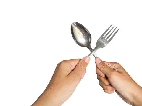 Crossed spoon and fork Stock Photos