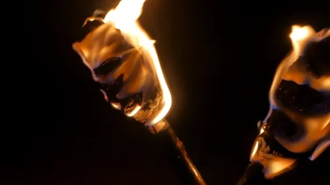 Crossed torches burn in the dark. Stock Footage 111177948