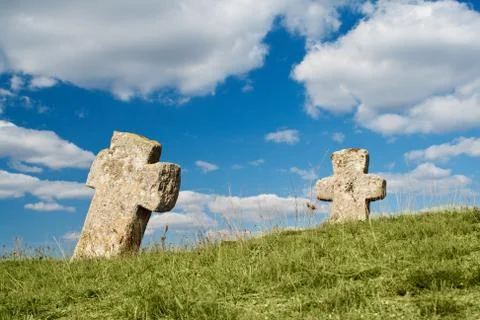 Crosses on blue cloudy sky Stock Photos