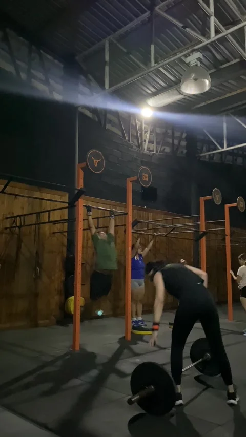 Crossfit Fan Falls Doing Kipping Pull-up, San Juan de Los Morros, Guarico, Venez Stock Footage 344028961