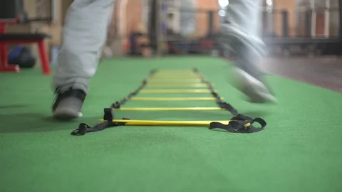 Crossfit Jumping in gym Stock Footage 104920541