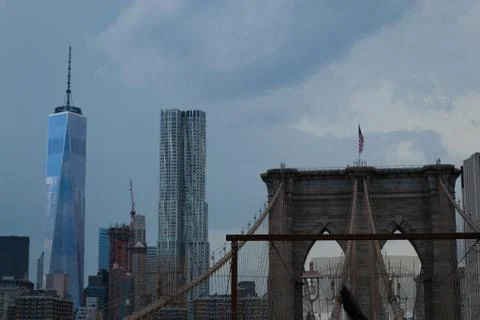 Crossing the Brooklyn bridge before a storm Stock Photos