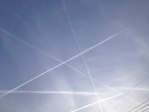 Crossing Contrails Stock Photos
