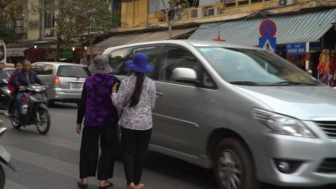 Crossing crazy Intersection With Traffic, Hanoi  Vietnam Stock-Footage 92925375
