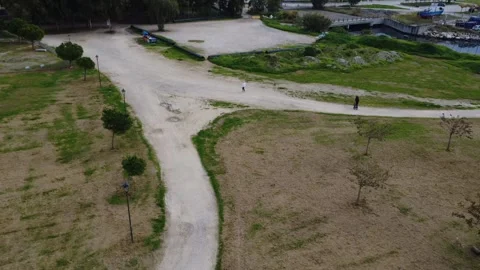 Crossing Dirt Paths In Urban Park With People Walking Stock Footage 343997590