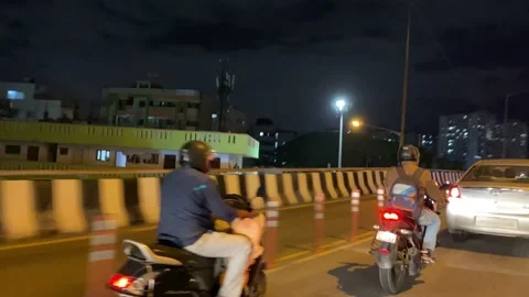 Crossing flyovers on full speed at night in traffic Video stock 162980306
