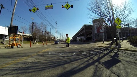 Crossing guard at intersection Stock Footage 92703601