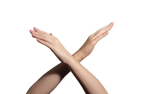 Crossing hands in an X shape, symbolizing refusal, prohibition, and denial... Stock Photos