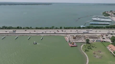 Crossing The I-30 Bridge In Rockwall, Texas over Lake Ray Hubbard Stock Footage 277364977