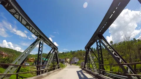 Crossing iron bridge in the mountain in uttrakhand Stock Footage 220414357