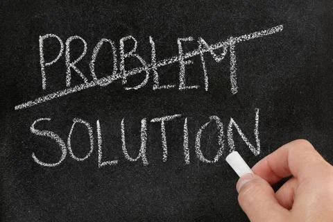 Crossing out the word problem and writing solution on blackboard Stock Photos