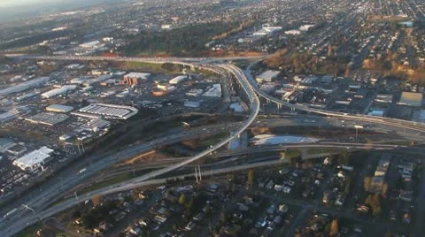 Crossing Over Intersection and Following Highway from the Air Stock Footage 10678996